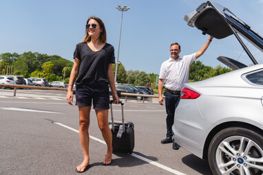 Girl walking away from private transfer