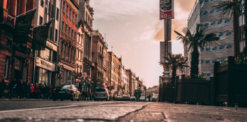 Dublin road with buldings on each side.