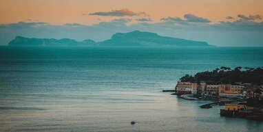 Sea around the Naples at sunset.