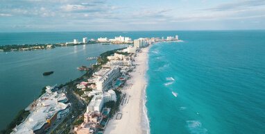 Cancun beach and hotles on small island in sea