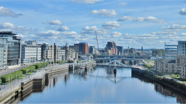 City of Glasgow with river, bridges and buildings.