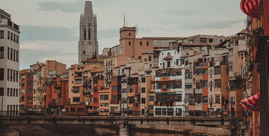 Girona buildings and cloudy sky.
