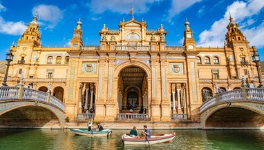 Building in Seville with river in front.