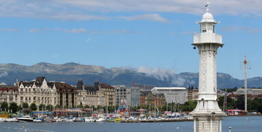 Geneva town with mountains in the distance.