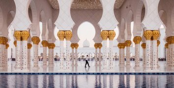 Man walking through Mosque in Abu Dhabi
