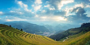 Green mountains in Bali on a sunny/cloudy day.