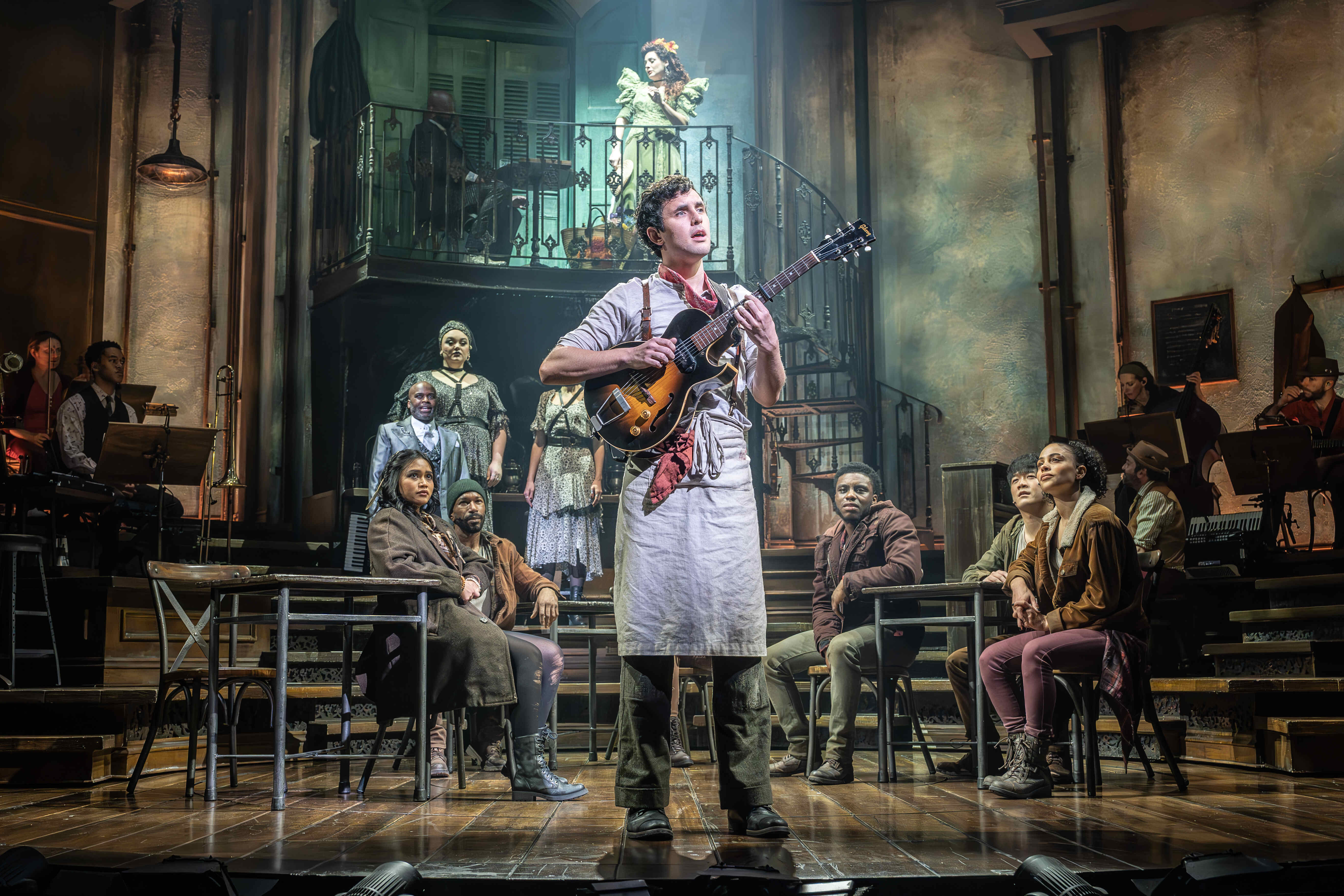 Intimate performance moment in Hadestown – photo by Marc Brenner