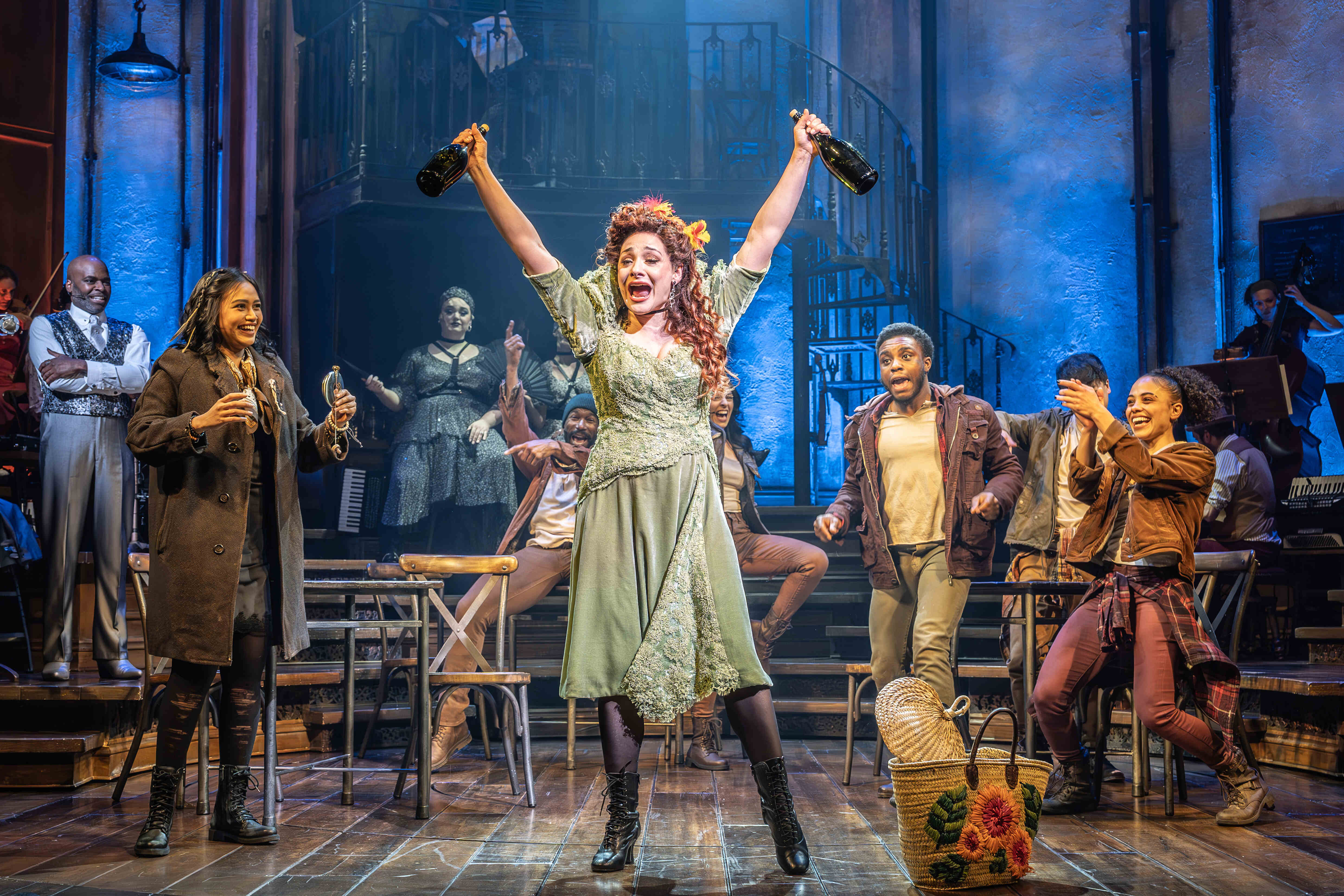 Scene from Hadestown featuring dramatic lighting – photo by Marc Brenner