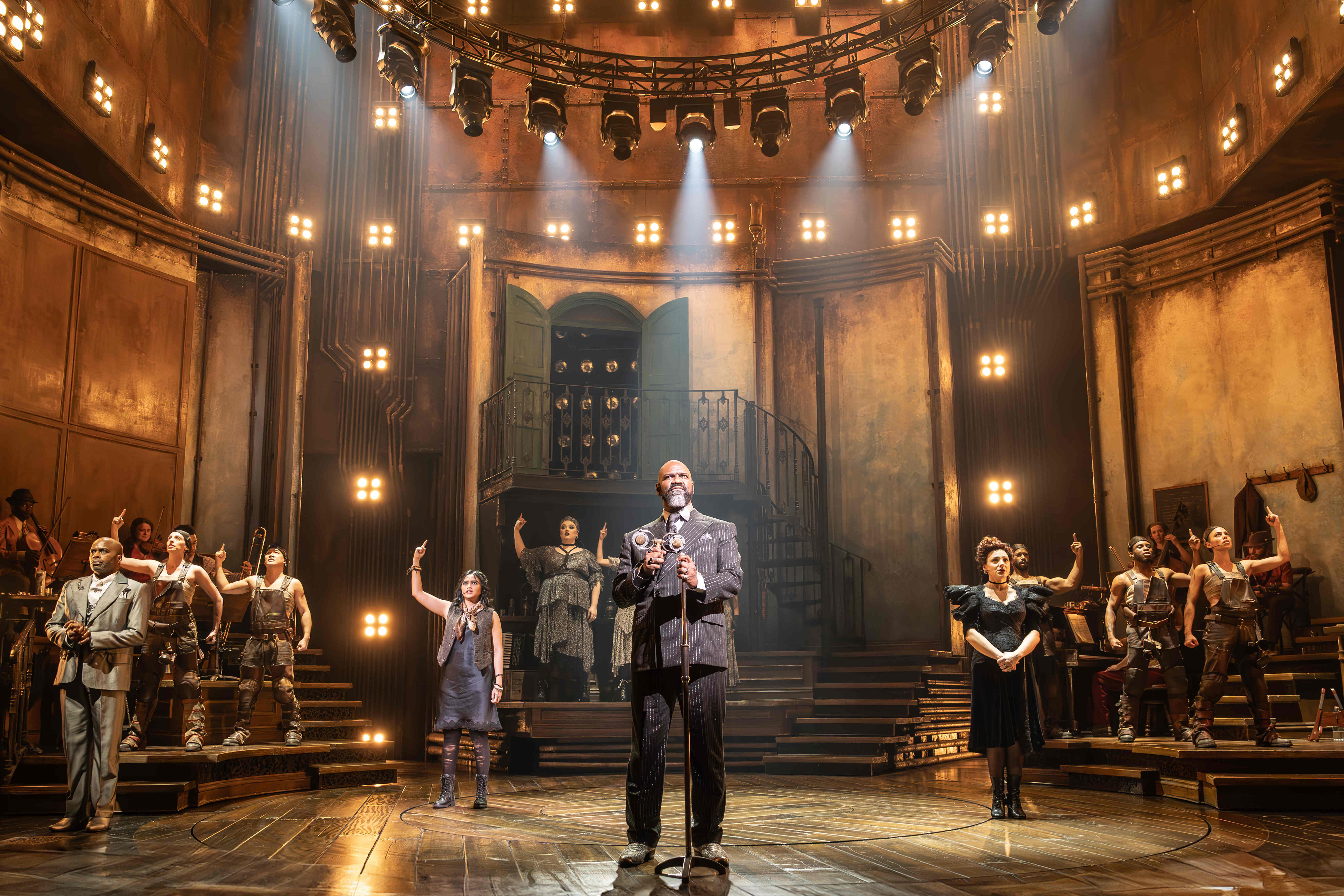Hadestown performers in a visually striking set – photo by Marc Brenner