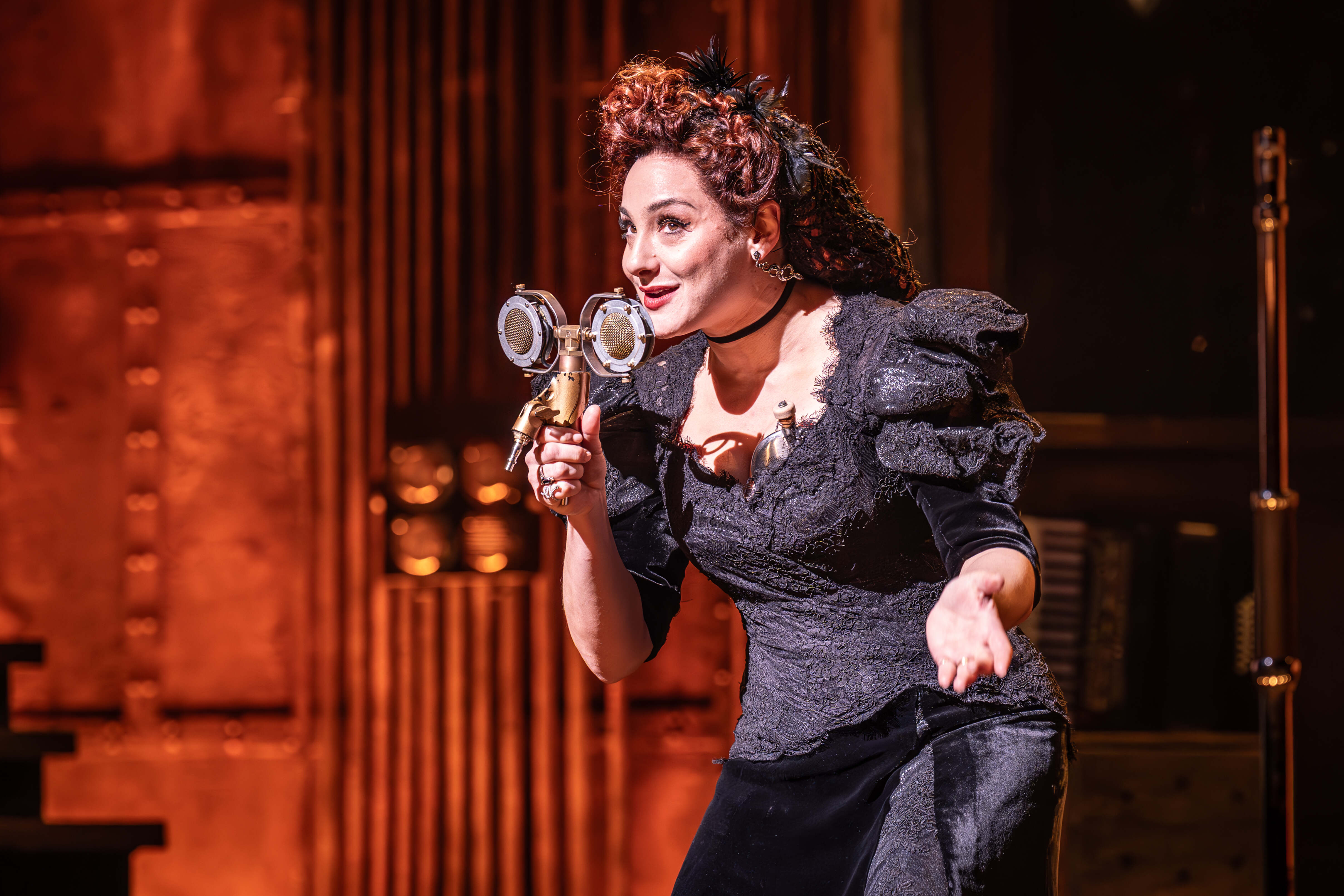 Finale scene in Hadestown with dramatic lighting – photo by Marc Brenner