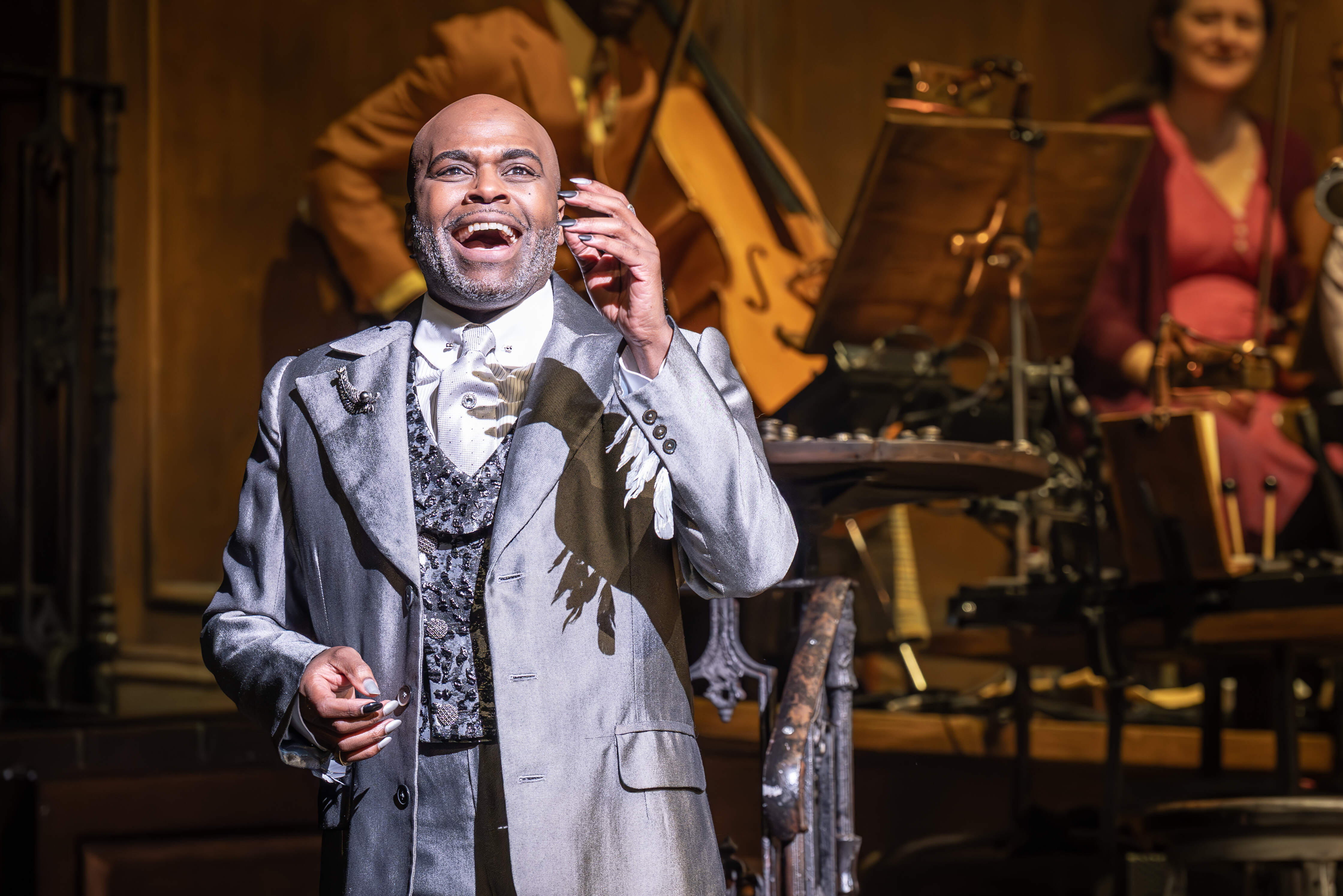 Hadestown performers mid-song – photo by Marc Brenner