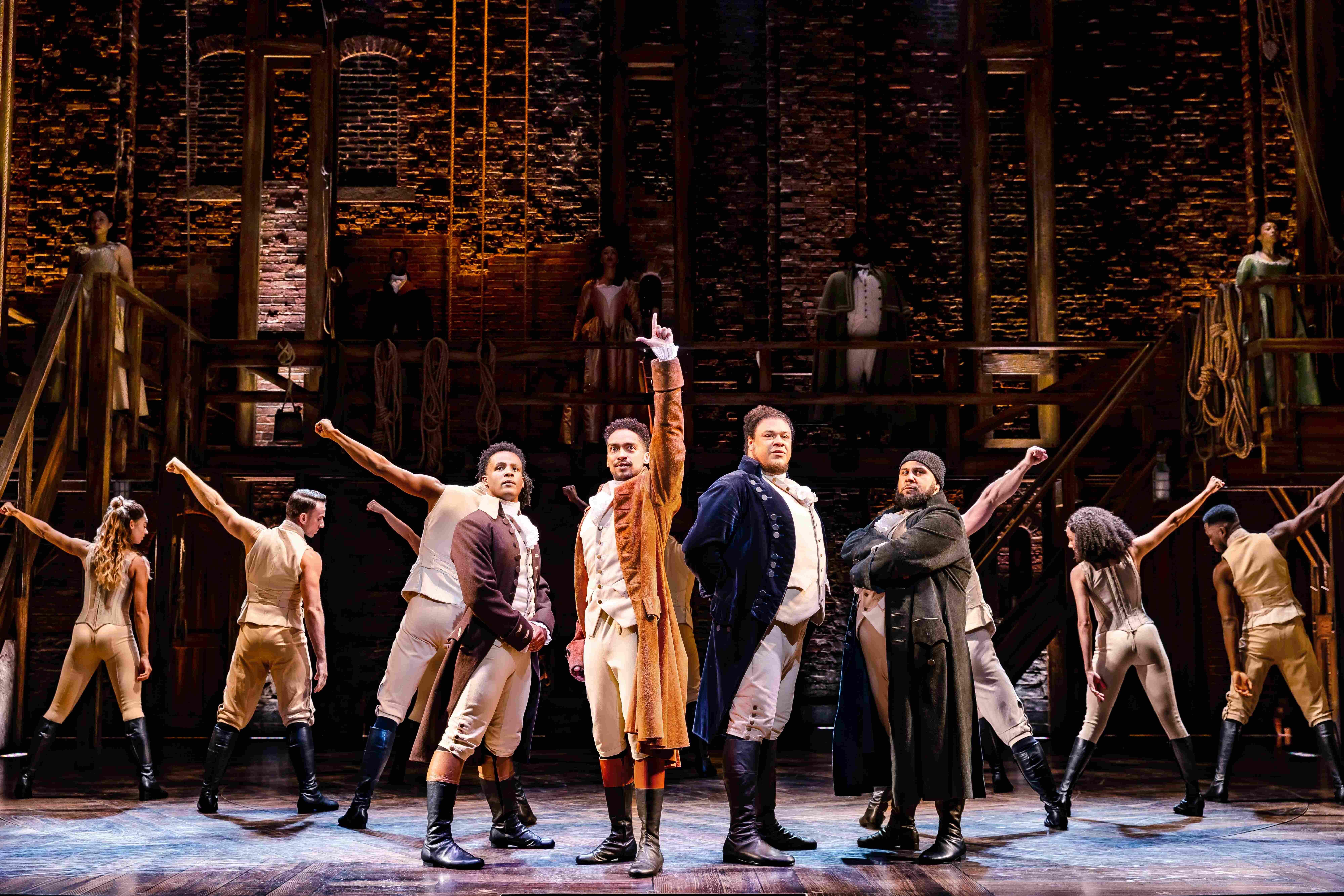 West End Theatre Packages - Vivid production stills from Hamilton The Musical, featuring key scenes and characters on stage.