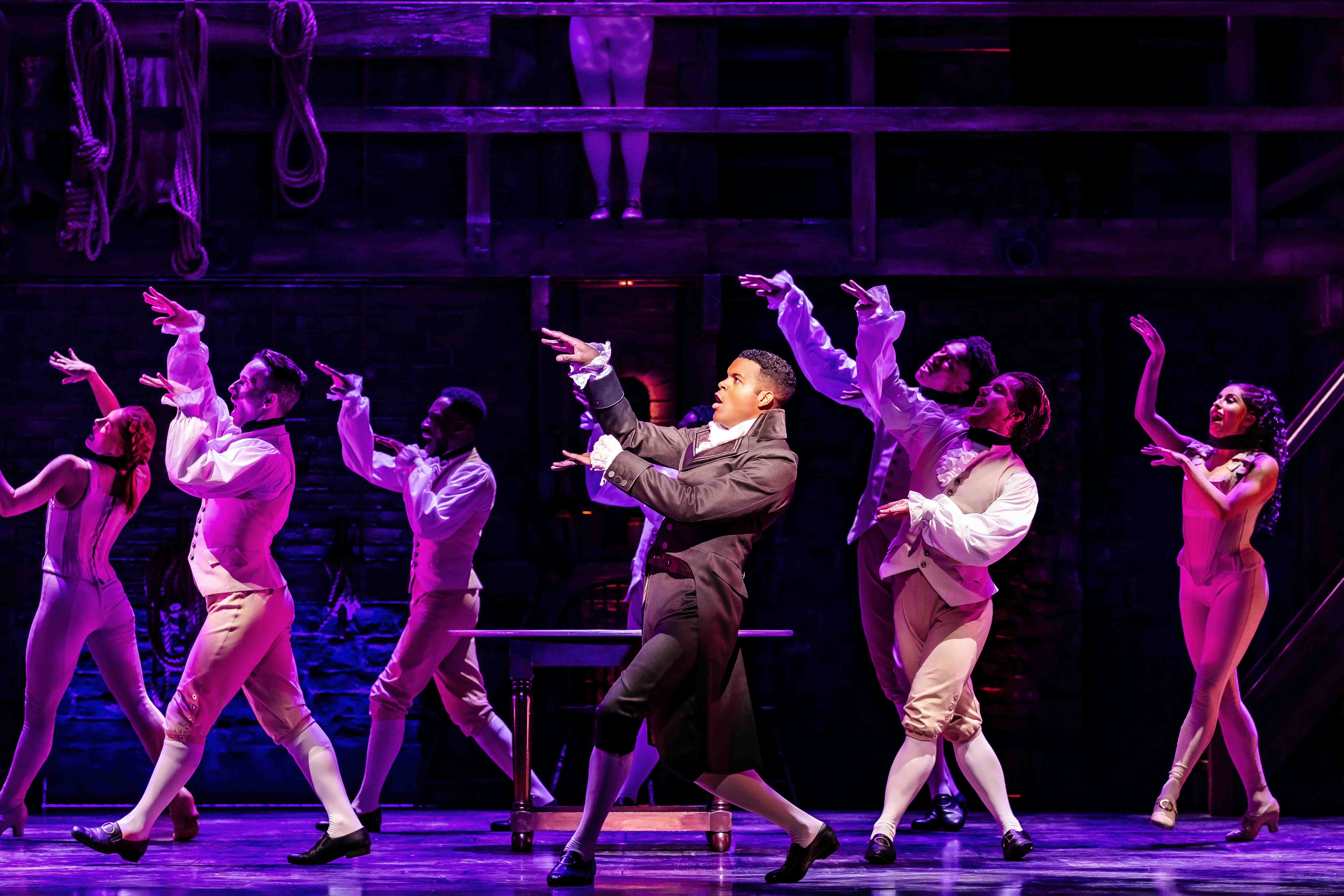 West End Theatre Packages - Vivid production stills from Hamilton The Musical, featuring key scenes and characters on stage.