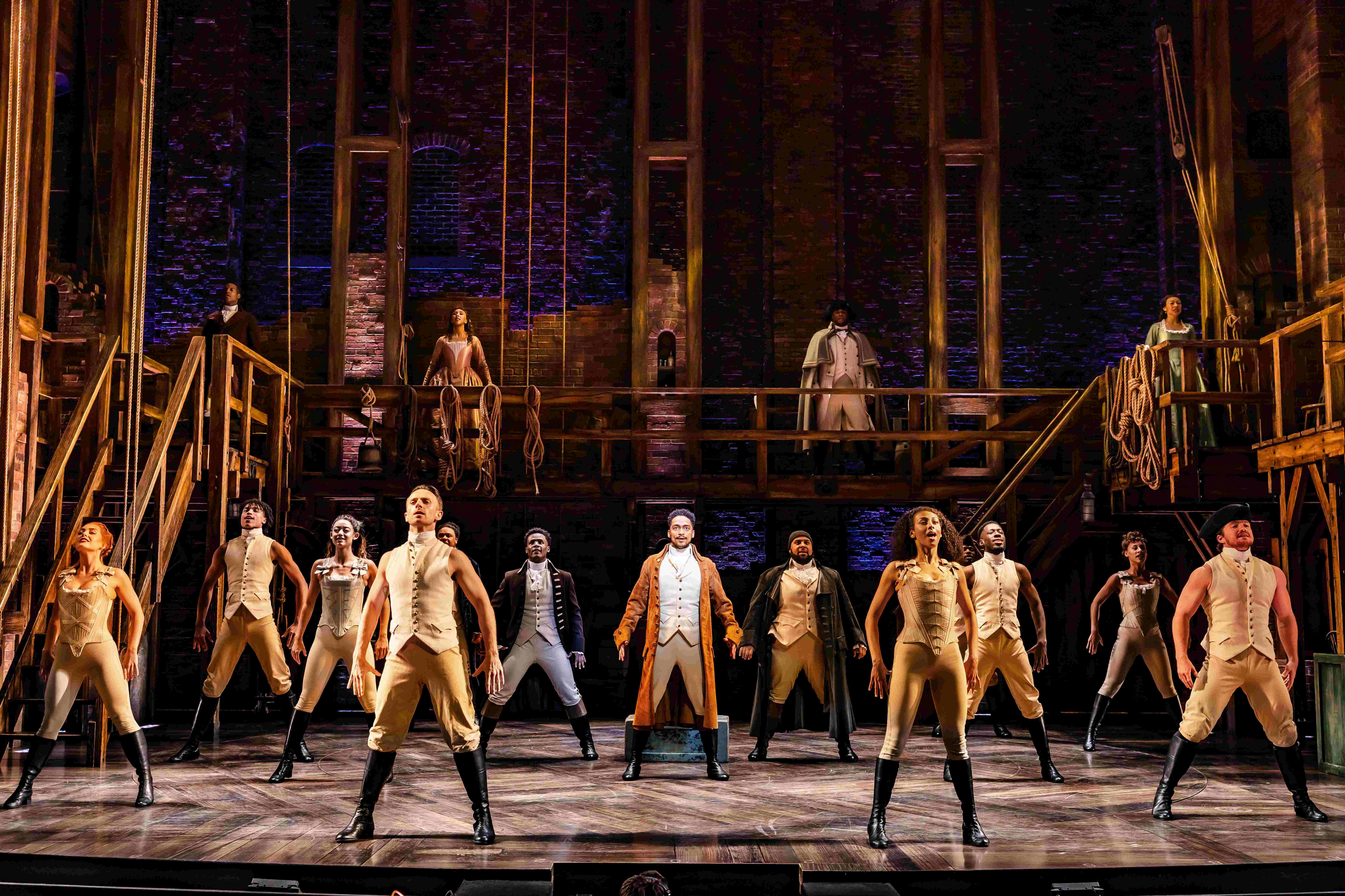 West End Theatre Packages - Vivid production stills from Hamilton The Musical, featuring key scenes and characters on stage.