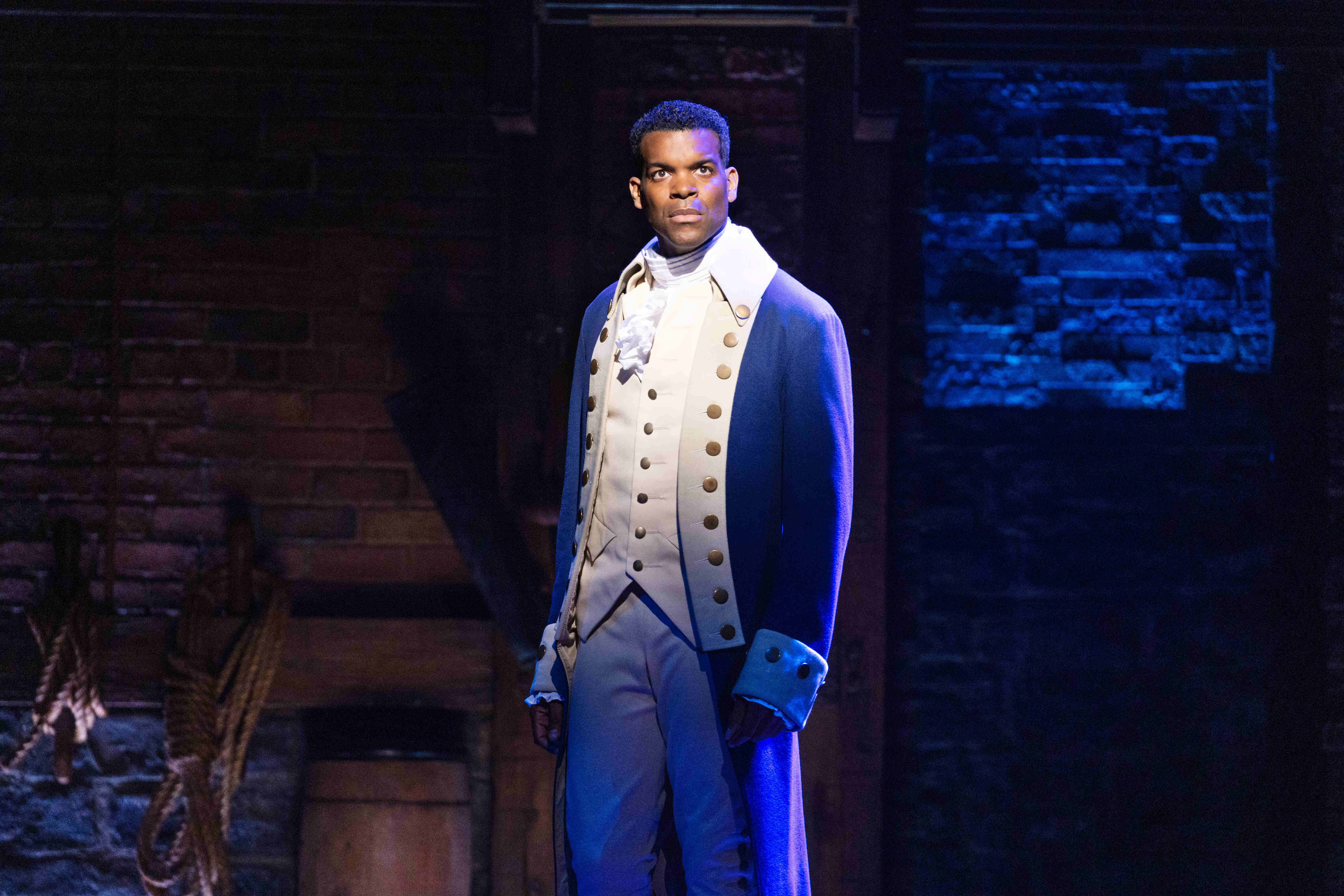 West End Theatre Packages - Vivid production stills from Hamilton The Musical, featuring key scenes and characters on stage.