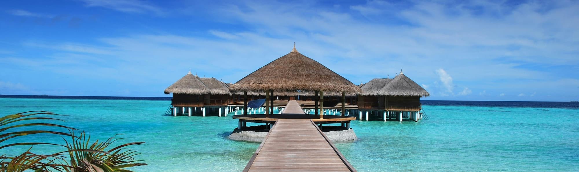 Image of resort huts in the Bali ocean
