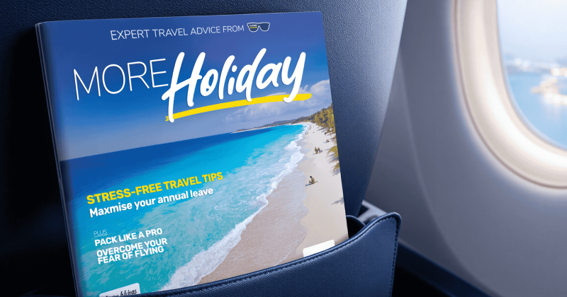More Holiday Travel Magazine in the back of an airplane seat pocket
