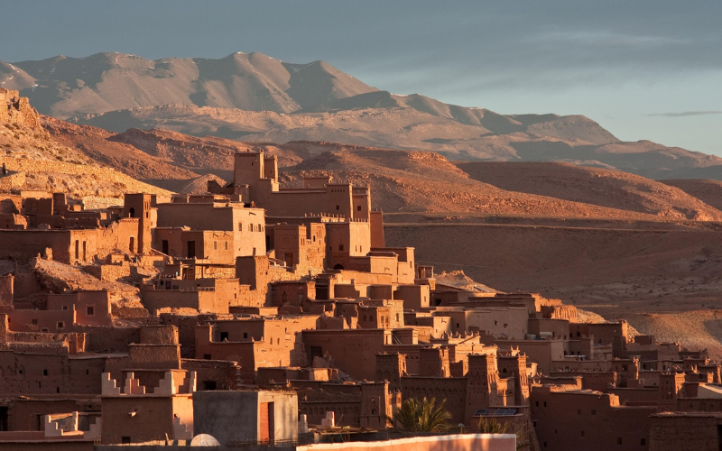 Aït Benhaddou’s historic mud-brick fortress surrounded by the Atlas Mountains in Morocco.