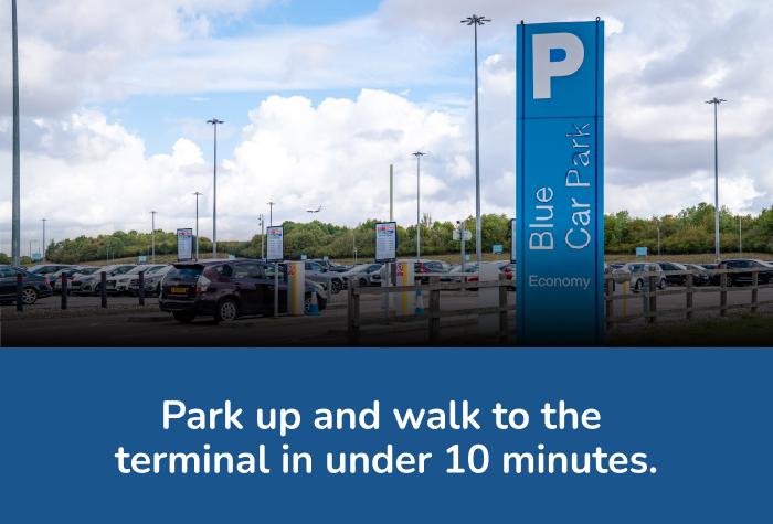 Stansted Short Stay Blue car park with text reading 'Park up and walk to the terminal in under 10 minutes'