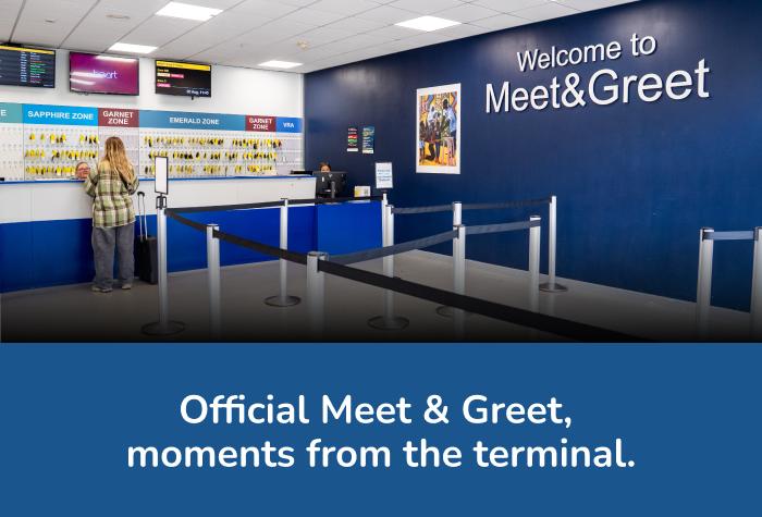 Female customer dropping off keys with staff member at Stansted Official Meet and Greet reception, with text reading 'Official Meet & Greet, moments from the terminal'