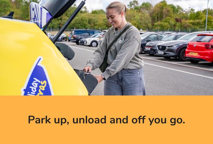 Female passenger smiling while getting luggage from the boot of her car at the Short Stay Premium Orange car park, with text at the bottom reading 'Park up, unload and off you go.'