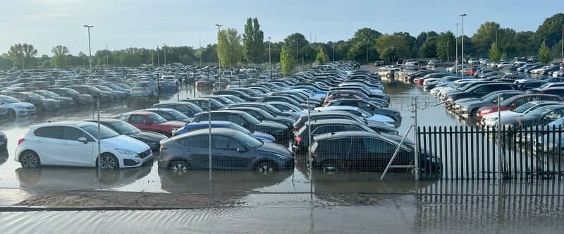 Burst water main at Heathrow Airport - view of the car park flooding and submerged cars