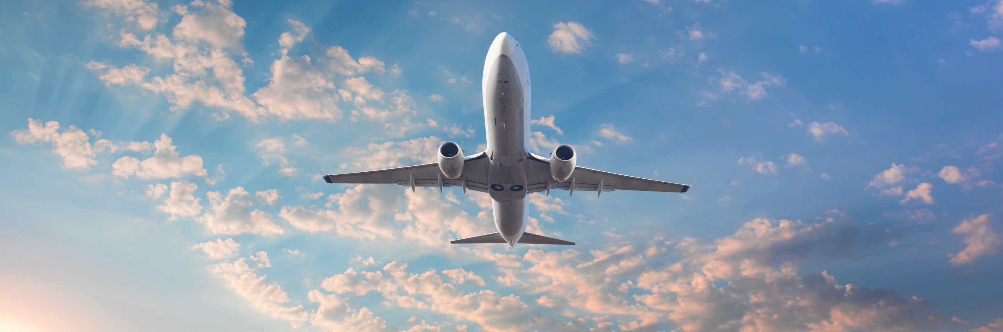 Open suitcase with packing essentials