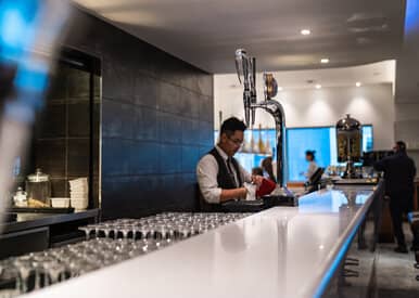 terminal 3 lounge man reading newspaper
