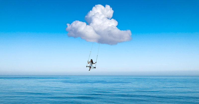 Holidaymaker holding travel documents — travel insurance cover and exclusions